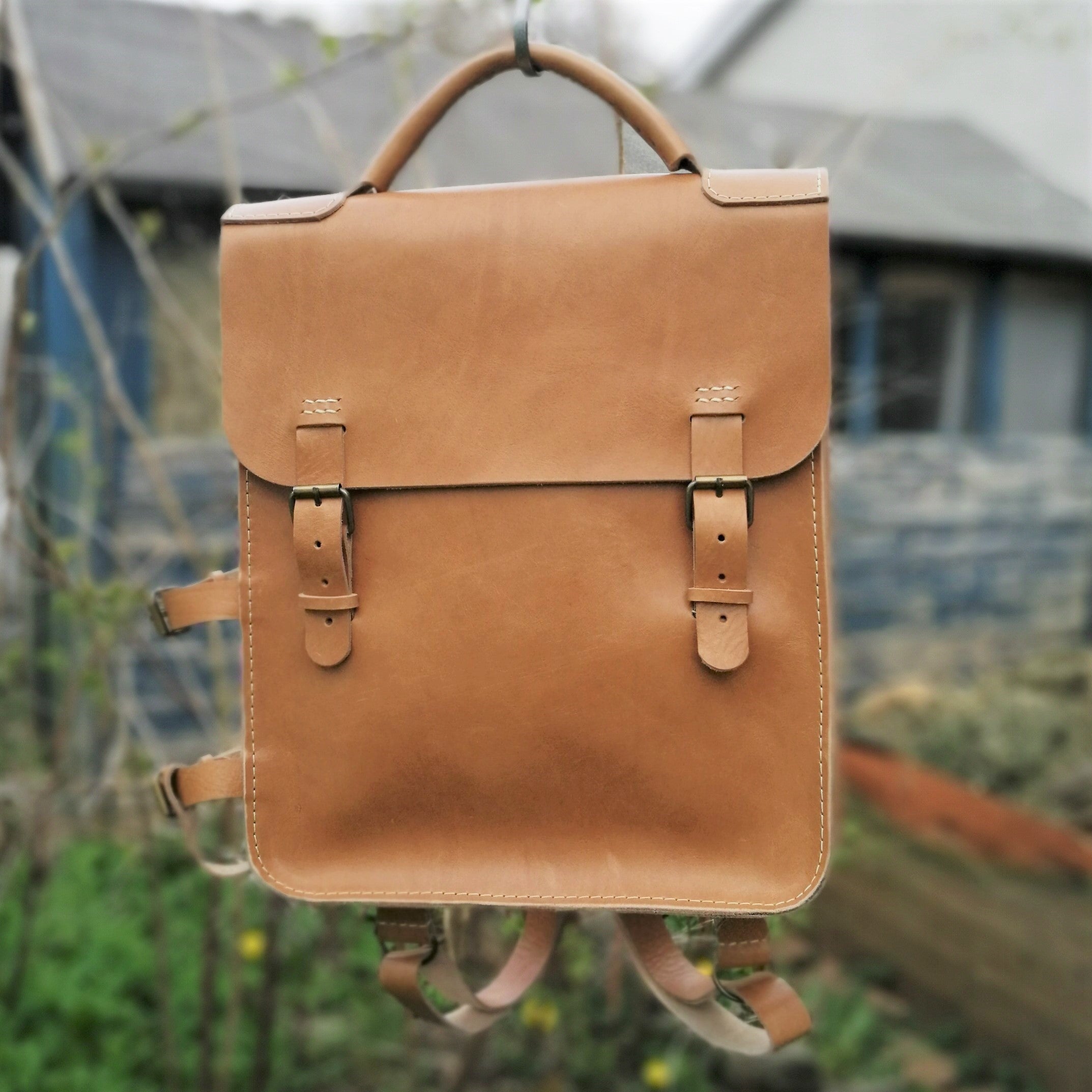 Leather explorer backpack hot sale